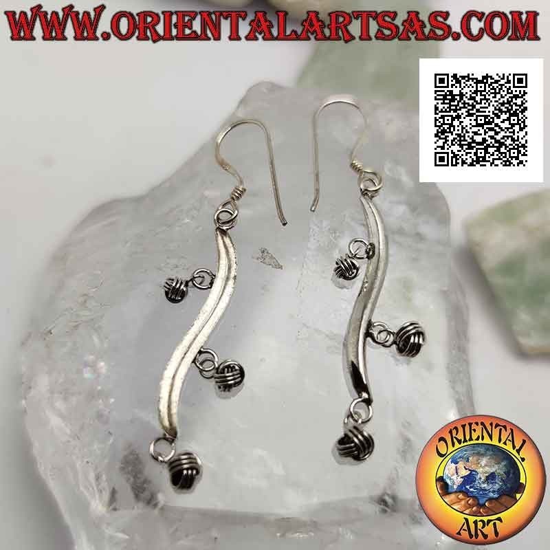Silver earrings with wavy line hooks with dangling balls of intertwining