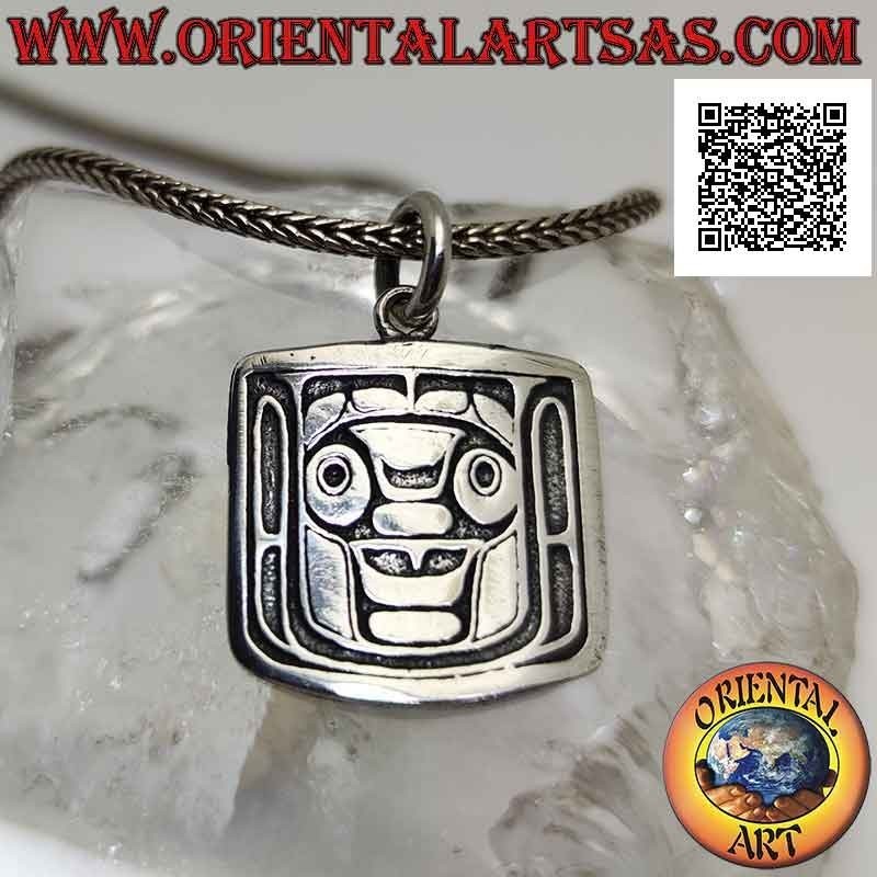 Silver pendant medal with Wiracocha, major Inca deity in bas-relief