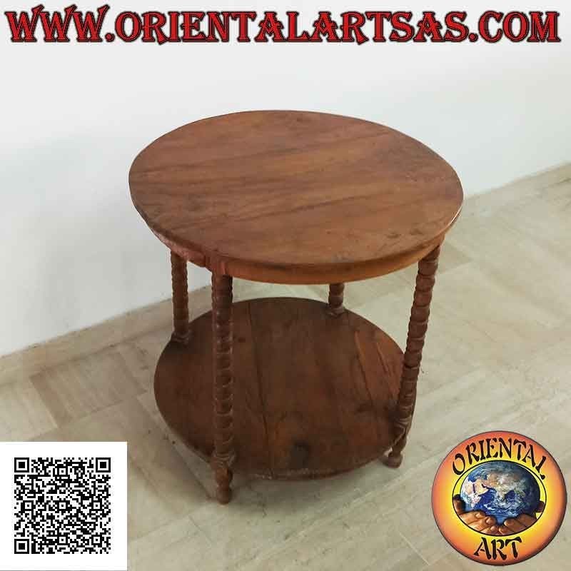 Mesa redonda con cuatro pies de esferas con estante debajo en madera de teca antigua (70 cm Ø)