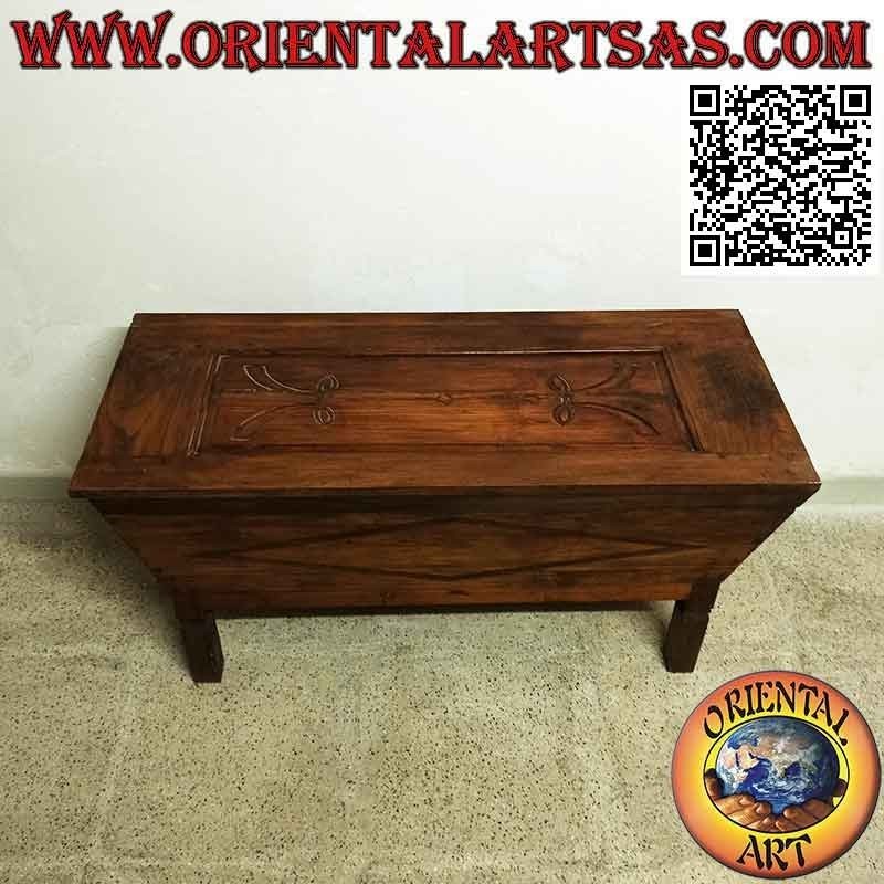 Traditional antique sideboard with carved decorations in antique teak wood