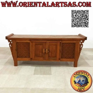 Antique Java buffet with wooden closures and hinges and panels with carved flowers in teak wood