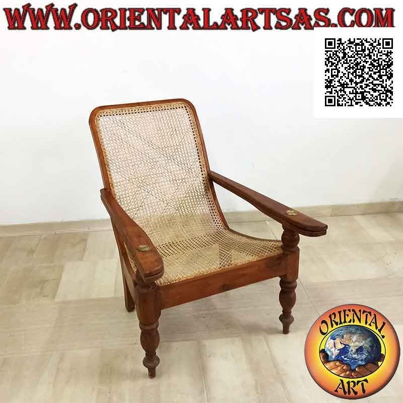 Fauteuil / méridienne antique de style colonial en bois de teck et paille de Vienne