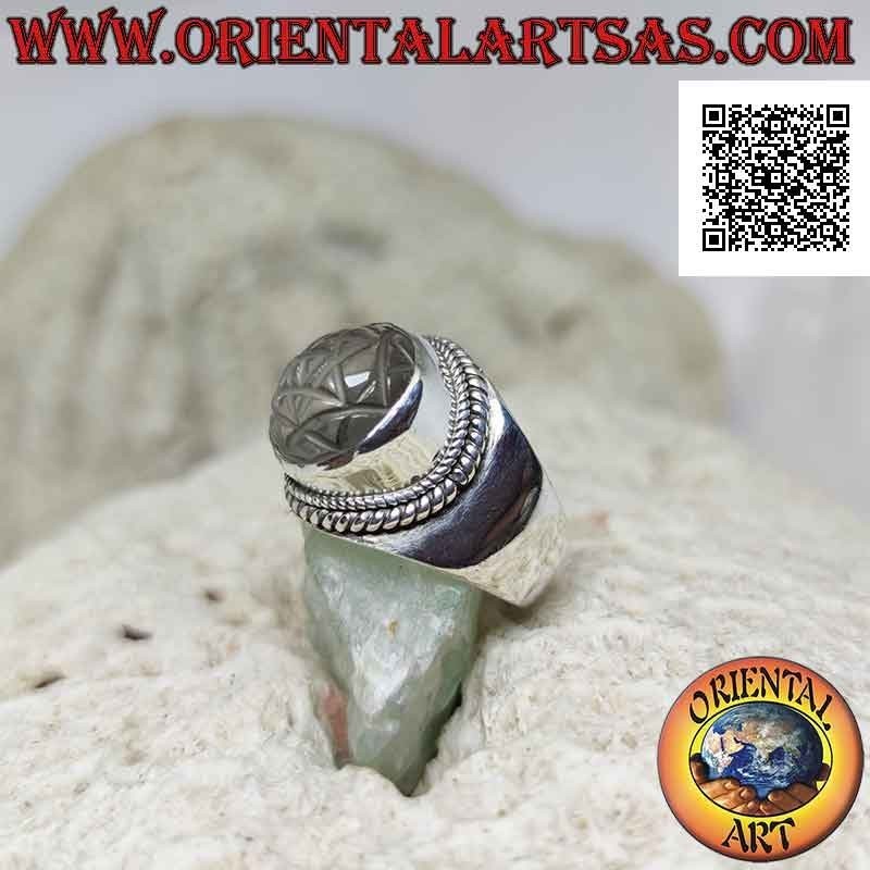Silver ring with Sri Yantra mandala engraved on round rock crystal