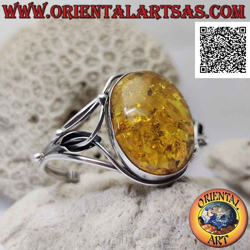 Bracciale rigido in argento 925‰ con grande ambra ovale cabochon e decorazione traforata floreale