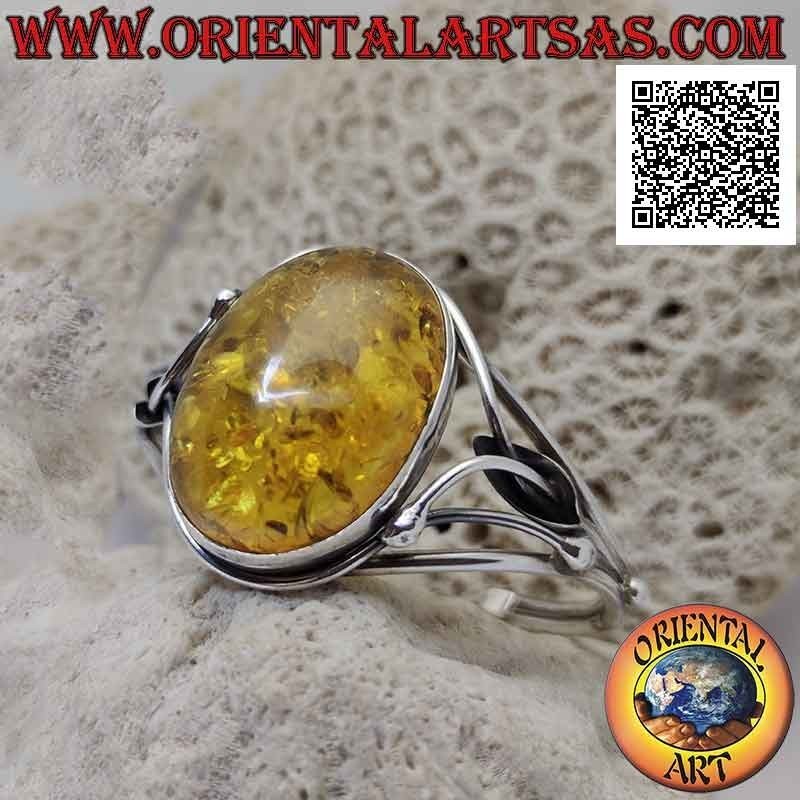 Pulsera rígida en plata 925 ‰ con gran cabujón ovalado de ámbar y decoración floral calada