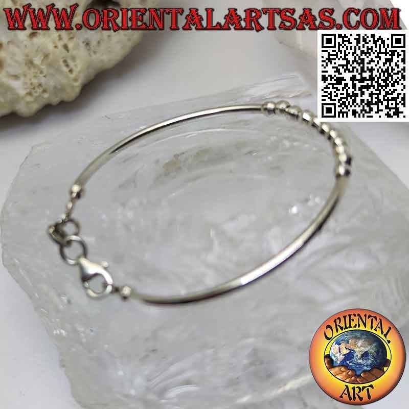 Pulsera infantil en tubos lisos de plata 925 ‰ con bolas de diamantes centrales
