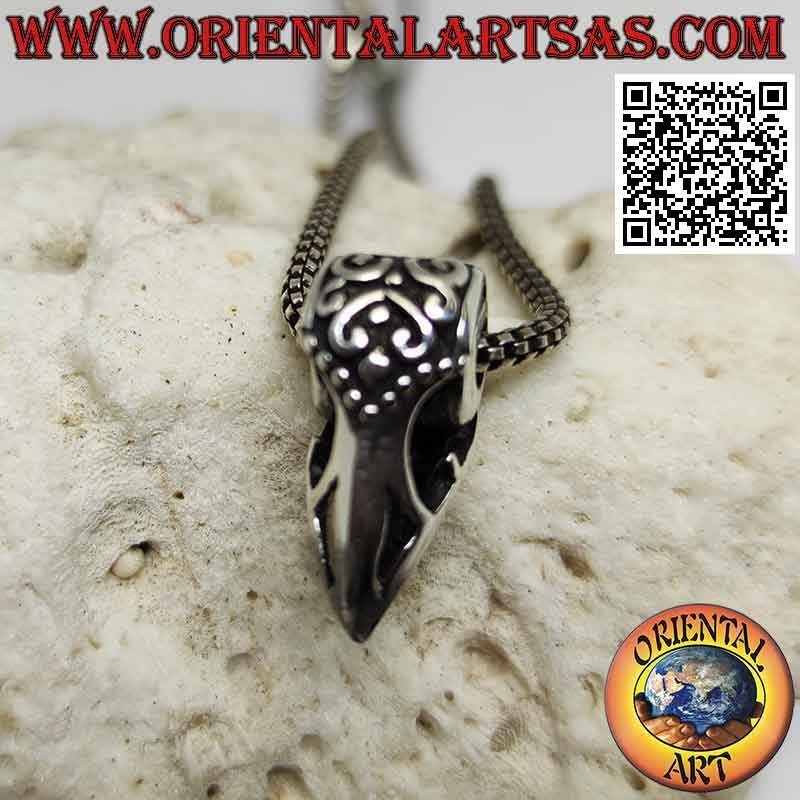 Colgante de plata, pico de rapaz (decorado y perforado)
