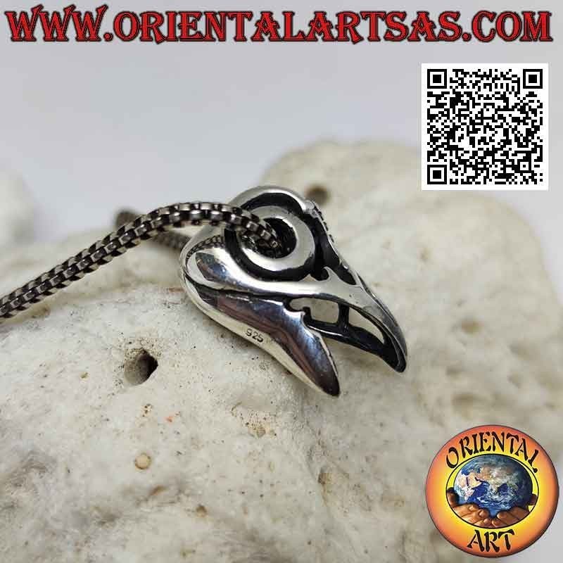 Silver pendant, the raptor's beak (decorated and pierced)