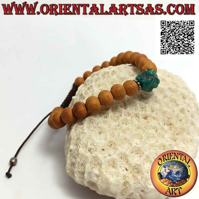 Mālā wrist bracelet in 8 mm beads. sandalwood and central turquoise (adjustable)