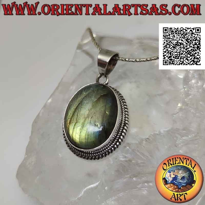 Silver pendant with a large oval cabochon labradorite surrounded by weaving