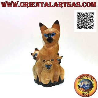 Sculpture the mother cat and the two puppies painted in balsa wood of 33 cm