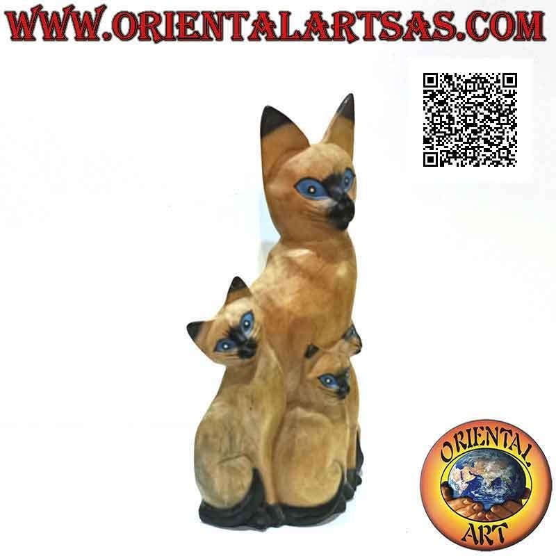 Sculpture the mother cat and the two puppies painted in balsa wood of 33 cm