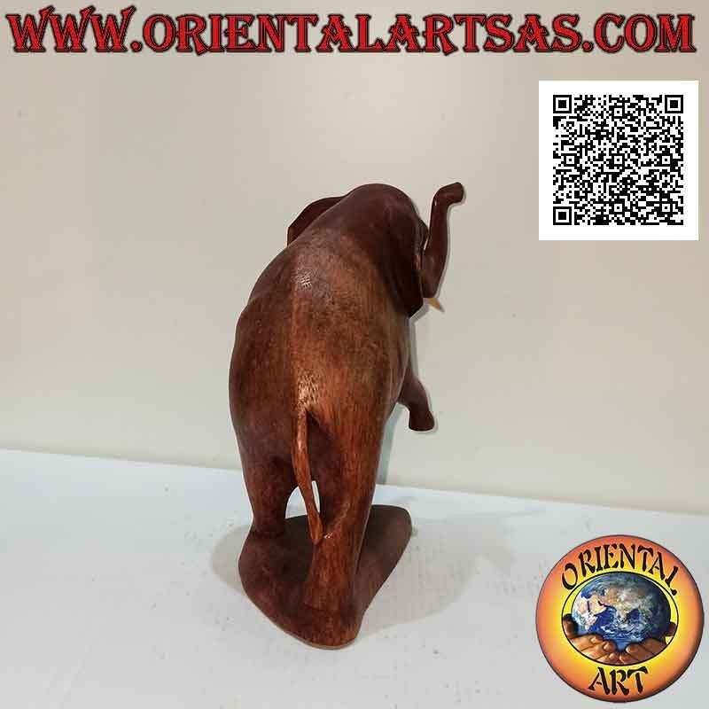 Sculpture d'un éléphant d'Afrique sur deux pattes avec trompe relevée, en bois de suar (17 cm)