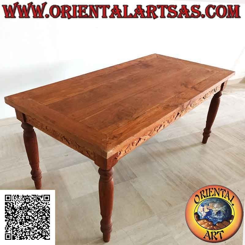 Table rectangulaire à deux tiroirs et décor floral sculpté sur 3 faces en bois de teck (180*90)