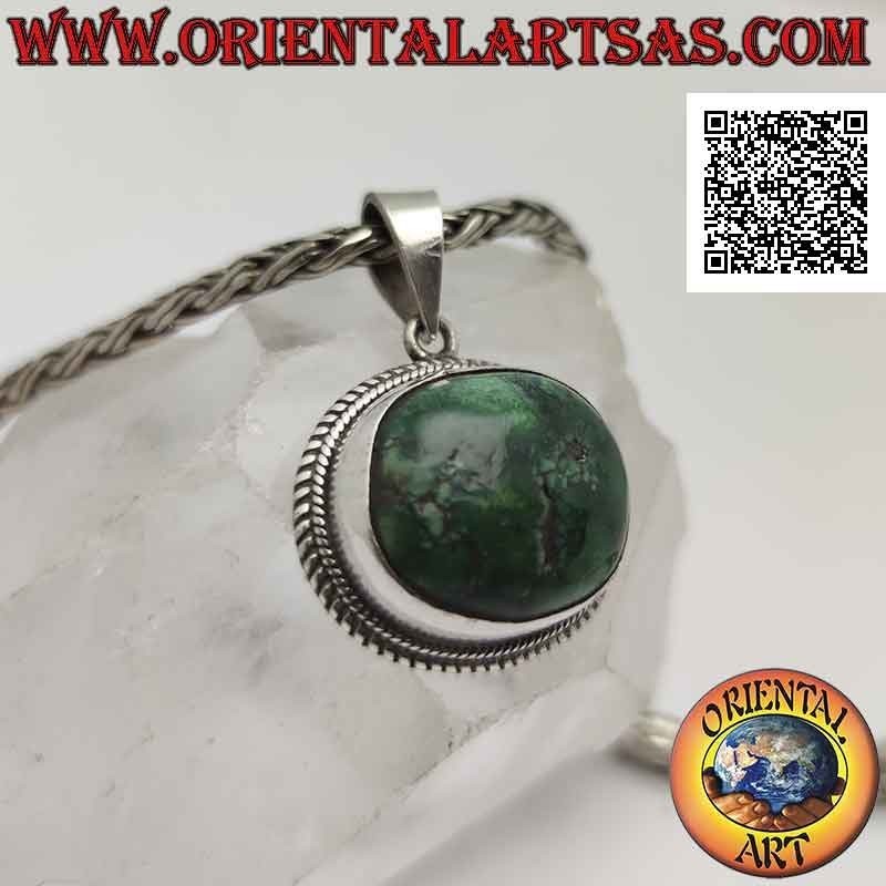 Silver pendant with natural oval irregular Tibetan antique turquoise surrounded by a double weave