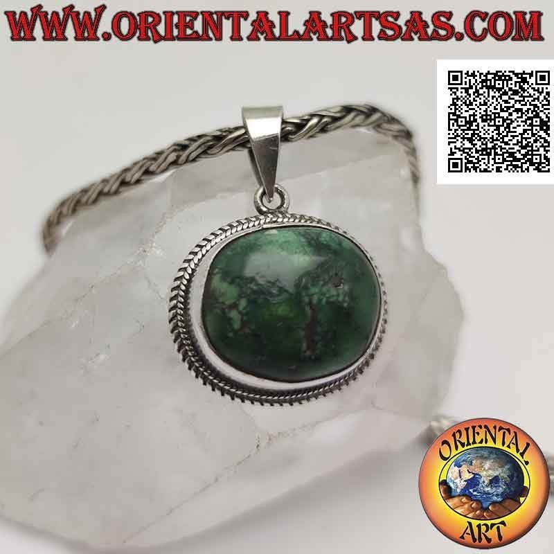 Silver pendant with natural oval irregular Tibetan antique turquoise surrounded by a double weave