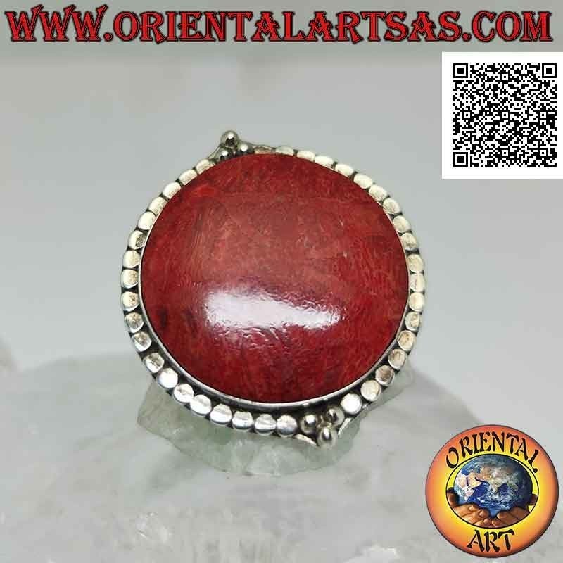 Anello in argento con madrepora rossa (corallo) tonda contornata da borchie e tris di palline sopra e sotto regolabile
