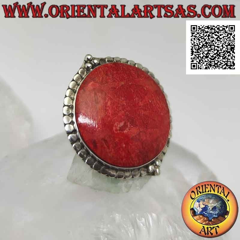 Silver ring with round red madrepora (coral) surrounded by studs and adjustable trio of balls