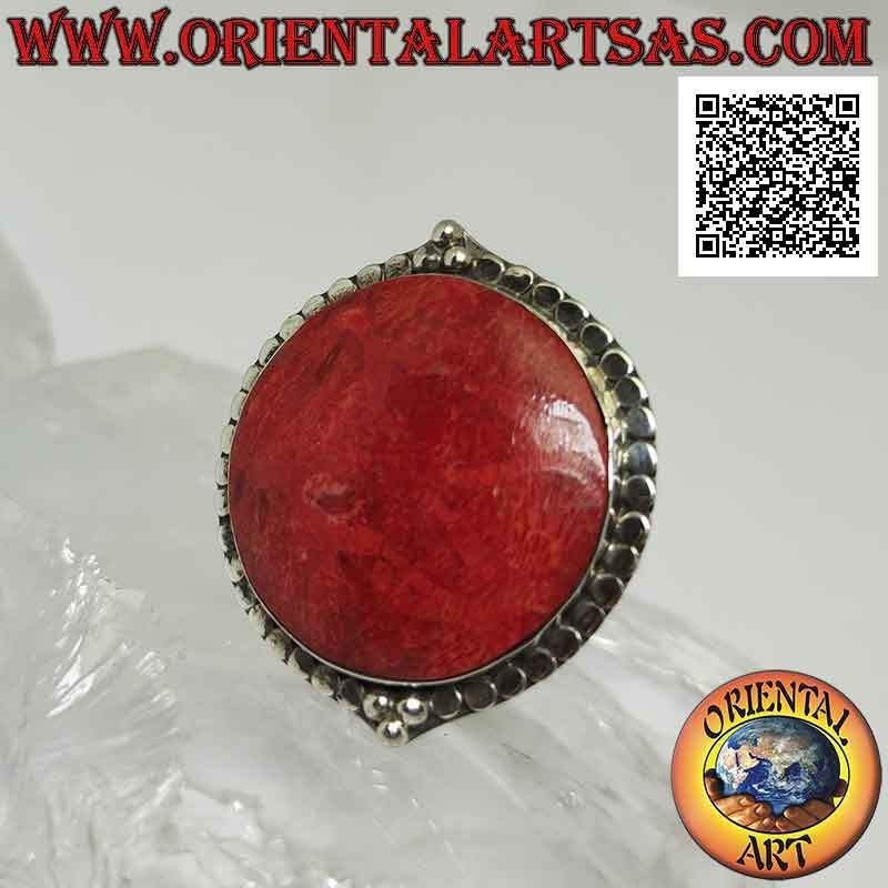 Silver ring with round red madrepora (coral) surrounded by studs and adjustable trio of balls