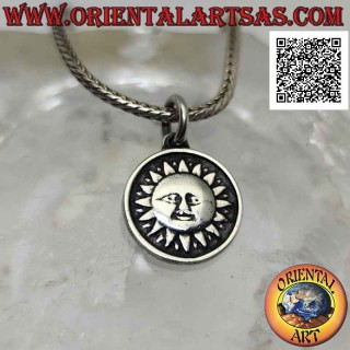 Silver pendant, round double-sided medal with sun on one side and moon and stars on the other