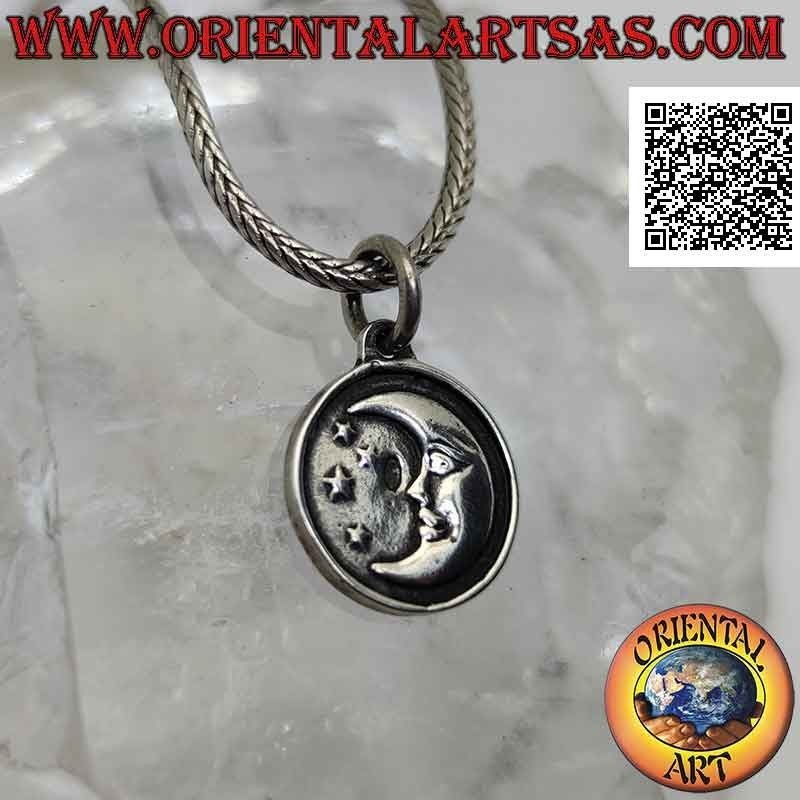 Silver pendant, round double-sided medal with sun on one side and moon and stars on the other
