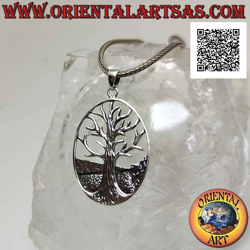 Silver pendant, Yggdrasil or tree of life in the oval with ground in the background