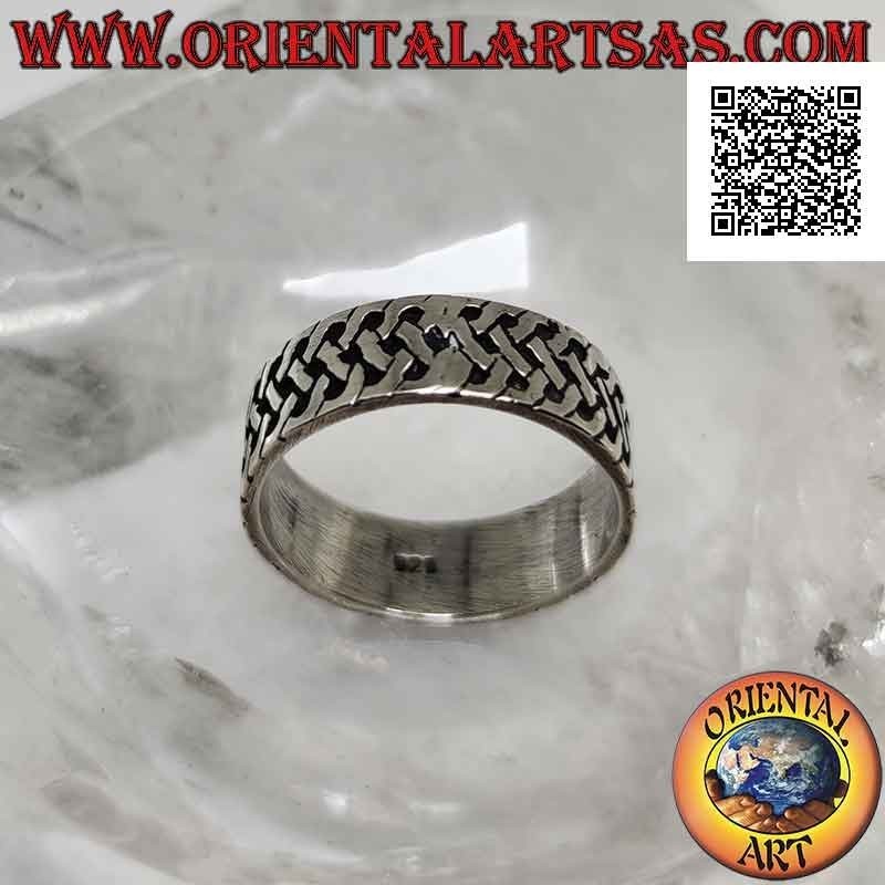 Silver ring with a worked band with a bas-relief woven mesh decoration