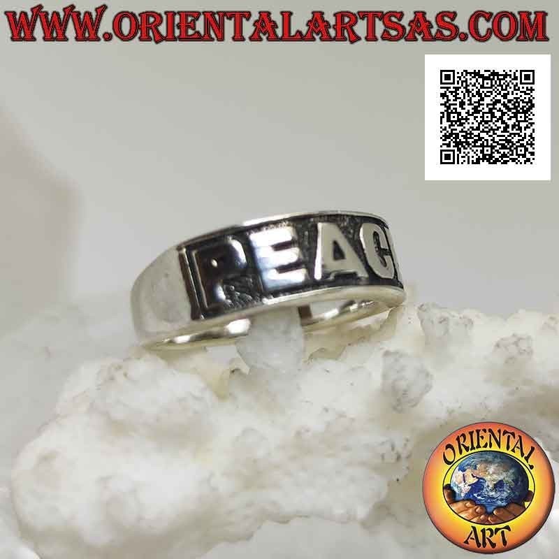 Silver ring with growing band with "PEACE" written in bas-relief