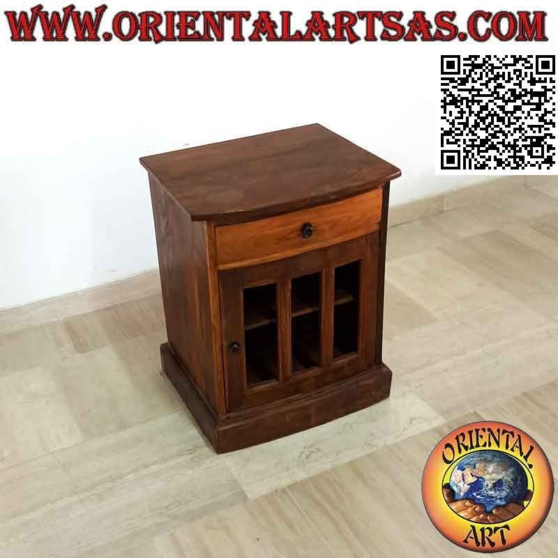 Mesita de noche con cajón y puerta de tres cristales y dos estantes de madera de teca