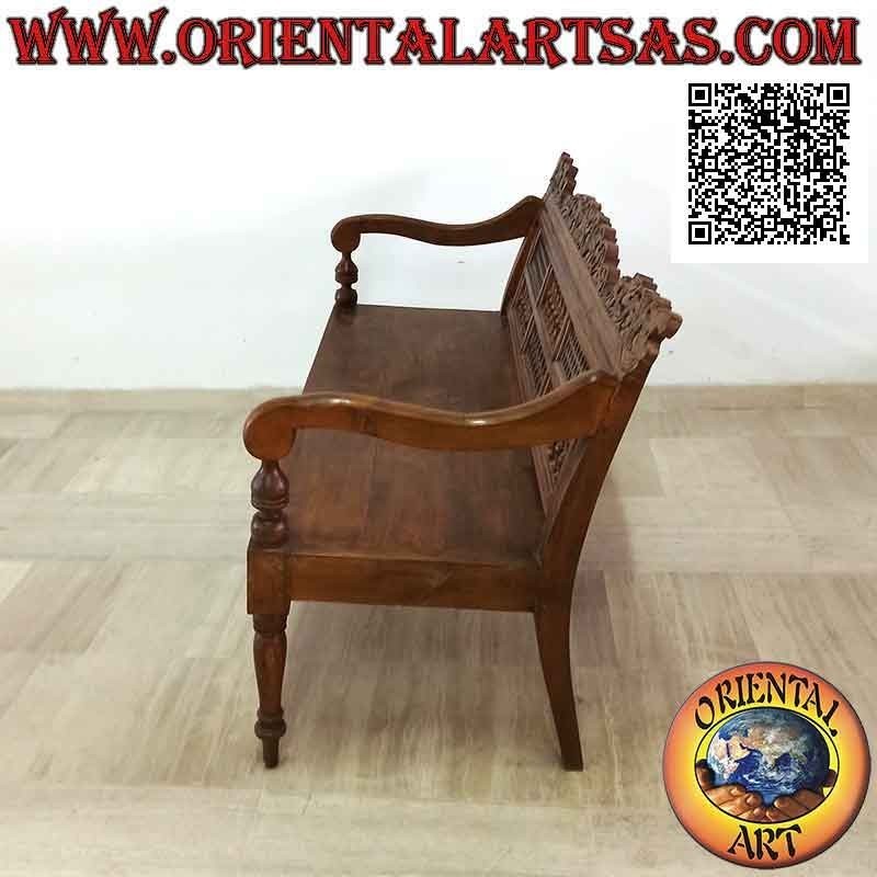 Three-seater bench with decoration of hand-carved dragons and squares of columns and tracery in teak wood