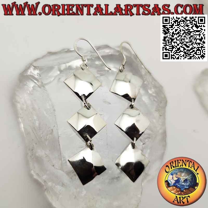Silver leverback earrings with a row of trio of pendent equilateral rhombuses
