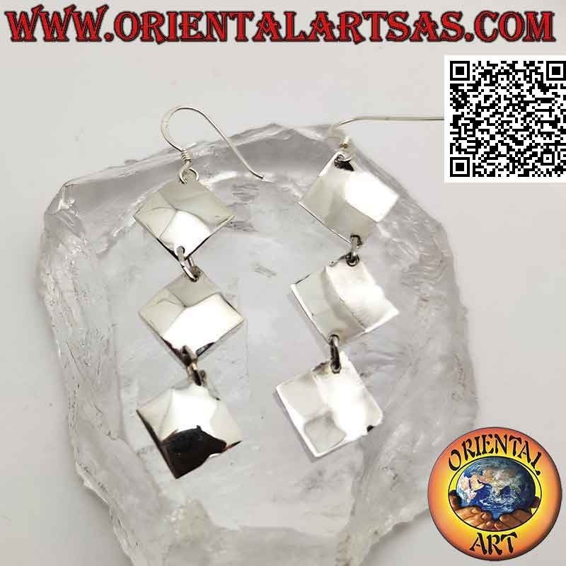Silver leverback earrings with a row of trio of pendent equilateral rhombuses