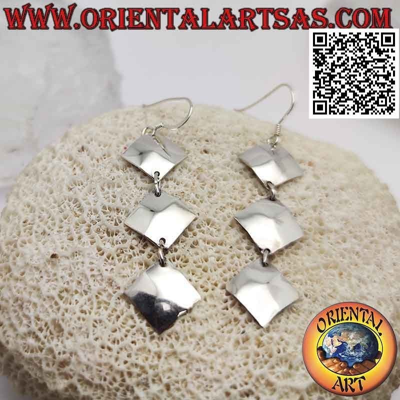Silver leverback earrings with a row of trio of pendent equilateral rhombuses