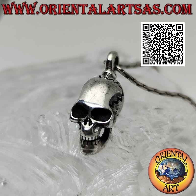 Silver pendant in the shape of a Skull (homo sapiens) with an elongated skull