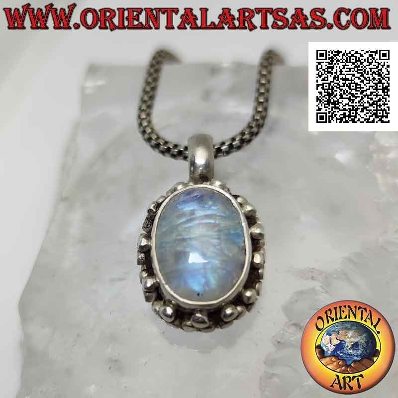 Pendentif en argent avec cabochon pierre de lune ovale entouré d'une double rangée de boules et de tris