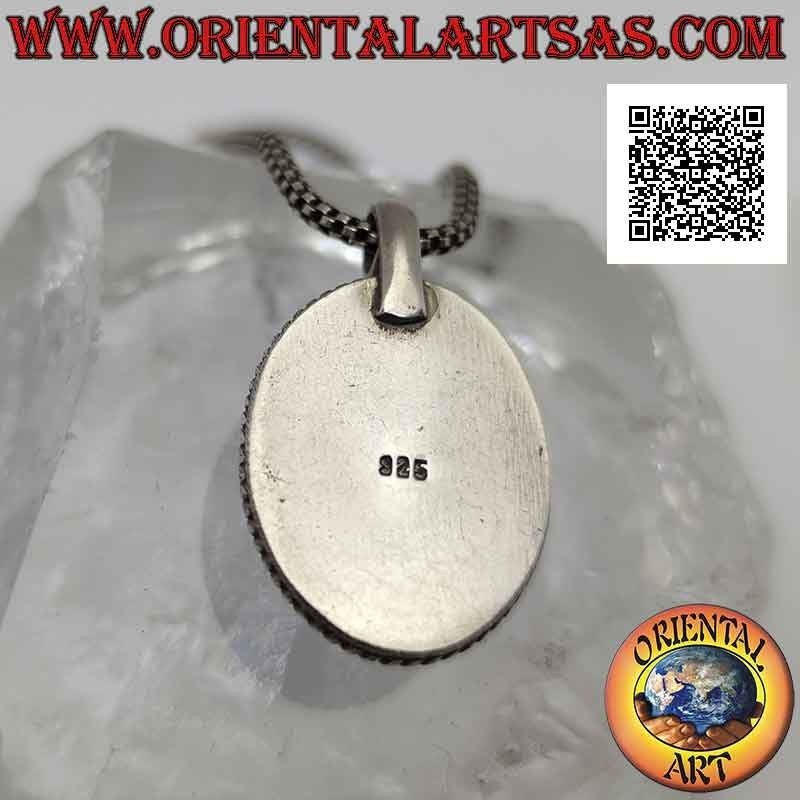 Pendentif en argent avec cabochon ovale malachite entouré de tissage