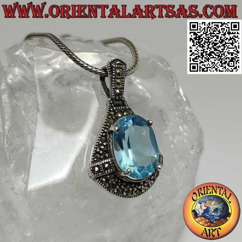 Silver pendant with oval blue Topaz surrounded by marcassites