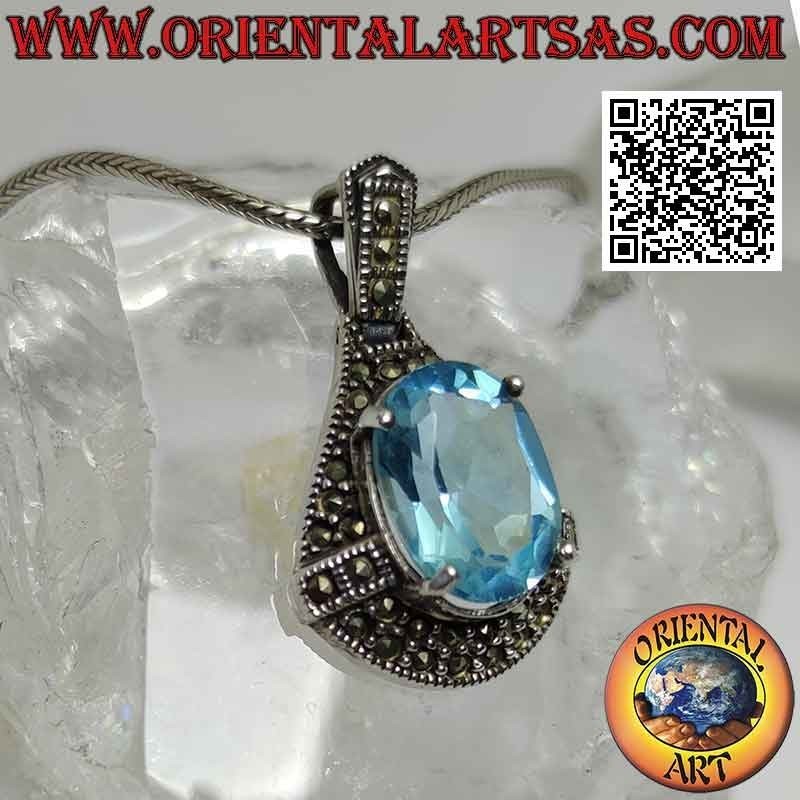 Silver pendant with oval blue Topaz surrounded by marcassites