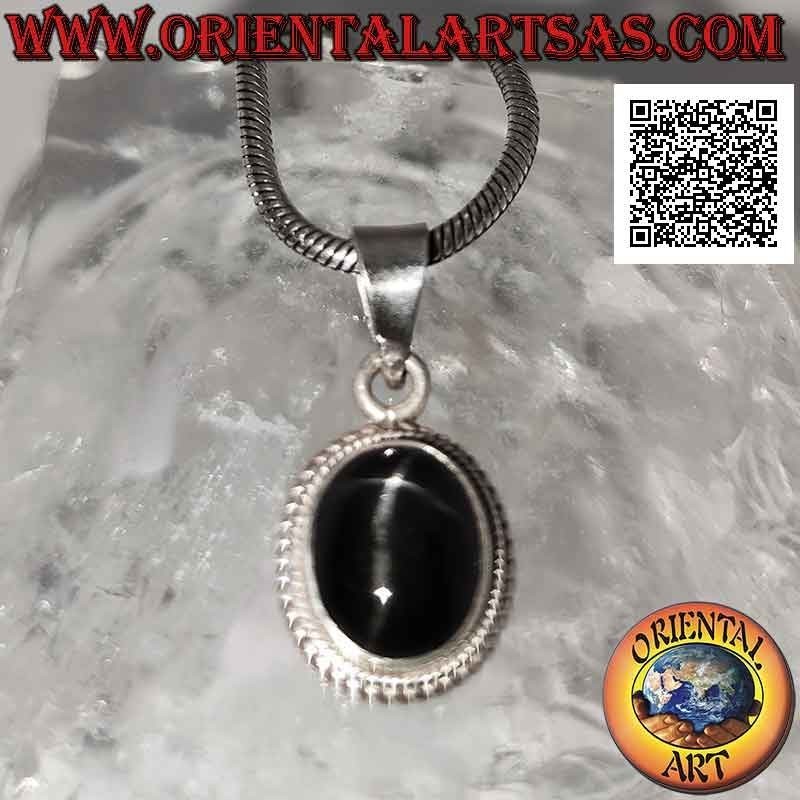 Silver pendant with black star (Diopside) oval cabochon surrounded by weaving