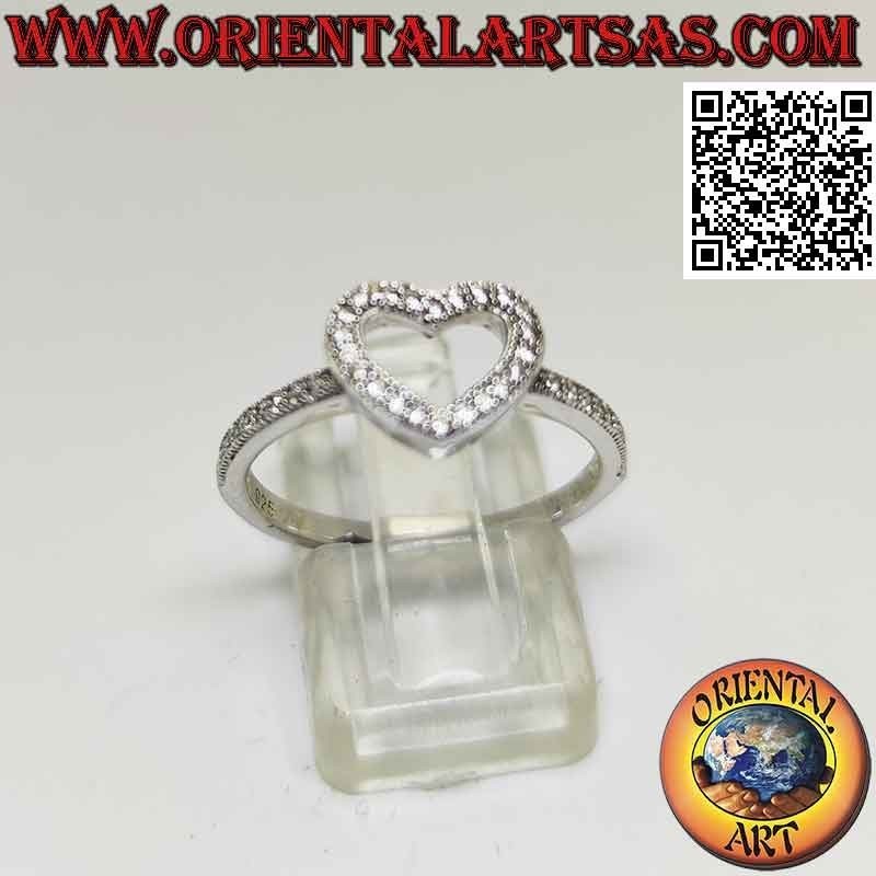 Silver ring with heart contour studded with zircons