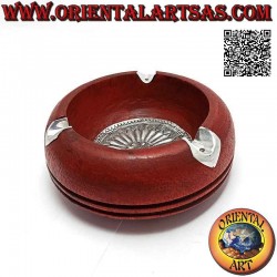 Round ashtray in mahogany...