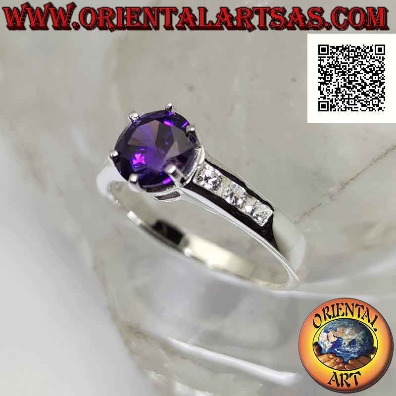 Silver ring with round synthetic amethyst set with white zircons on the sides