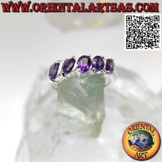 Silver ring with five oval synthetic amethysts set at an angle