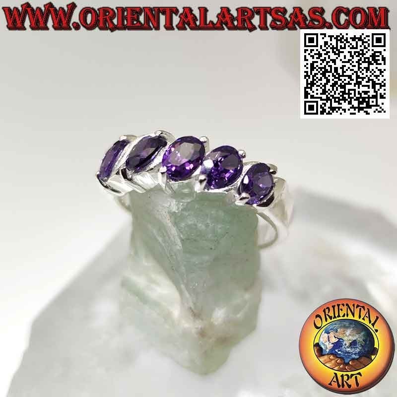 Silver ring with five oval synthetic amethysts set at an angle