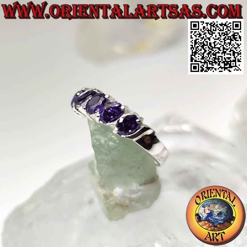 Silver ring with five oval synthetic amethysts set at an angle