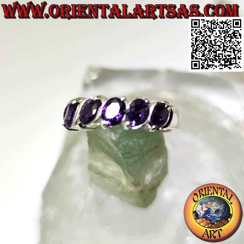 Silver ring with five oval synthetic amethysts set at an angle