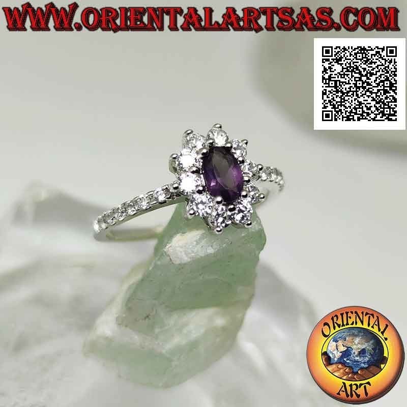 Silver ring with white cubic zirconia flower set with oval amethyst and cubic zirconia on the sides