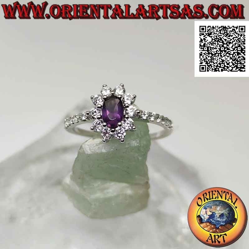 Anillo de plata con flor de circonita blanca engastada con amatista ovalada y circonita en los lados