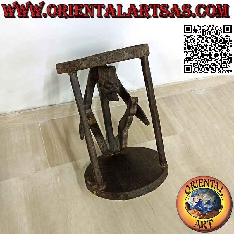 Primitive style stool with sculpture of an aboriginal in teak wood (30 cm Ø)