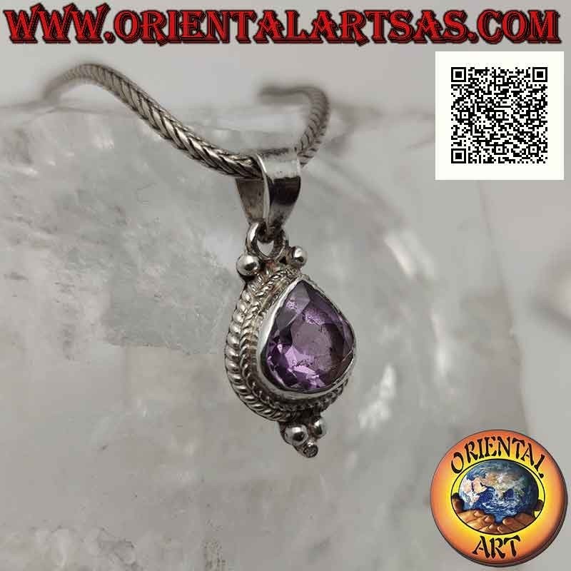 Silver pendant with drop-shaped amethyst surrounded by interweaving and three balls below (B)